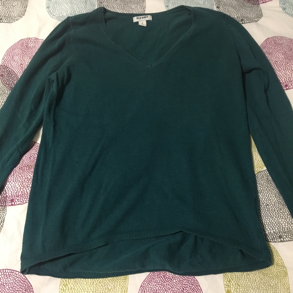 Green V-neck sweater
